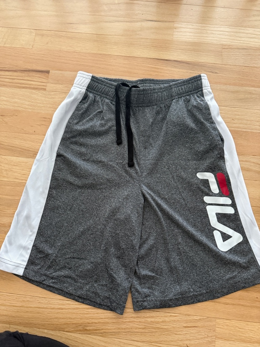 Fila Men’s Gray Athletic Shorts with White Side Panels and Red Logo Accent